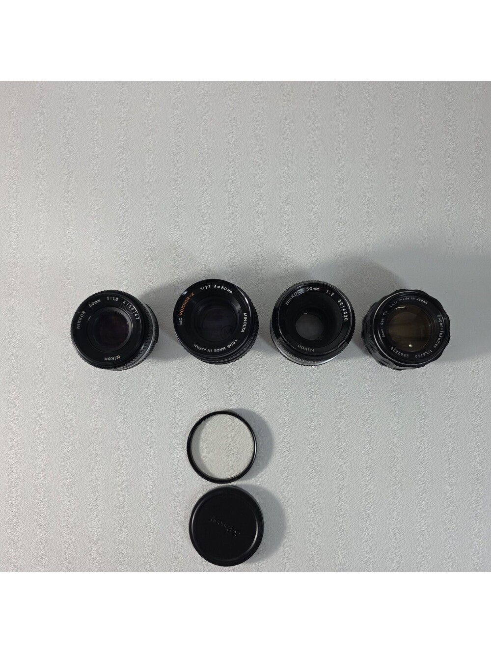 4x Vintage Lens Lot AS-IS Fungus - Nikkor 50mm f/1.8 1/2 Minolta 50/1.7 Takumar - Picture 1 of 9